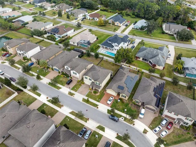 an aerial view of a city with lots of residential buildings