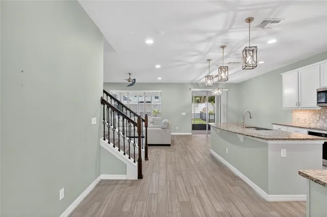 a view of a kitchen and a sink