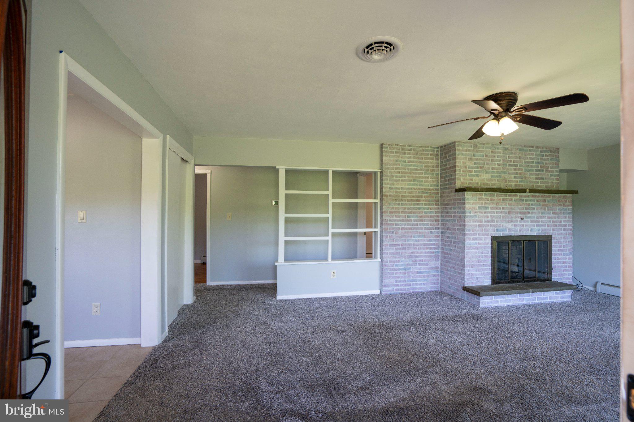 1639 Houserville Road State College, PA 16801 - Photo 5 of 54 Spacious living area with cozy fireplace.