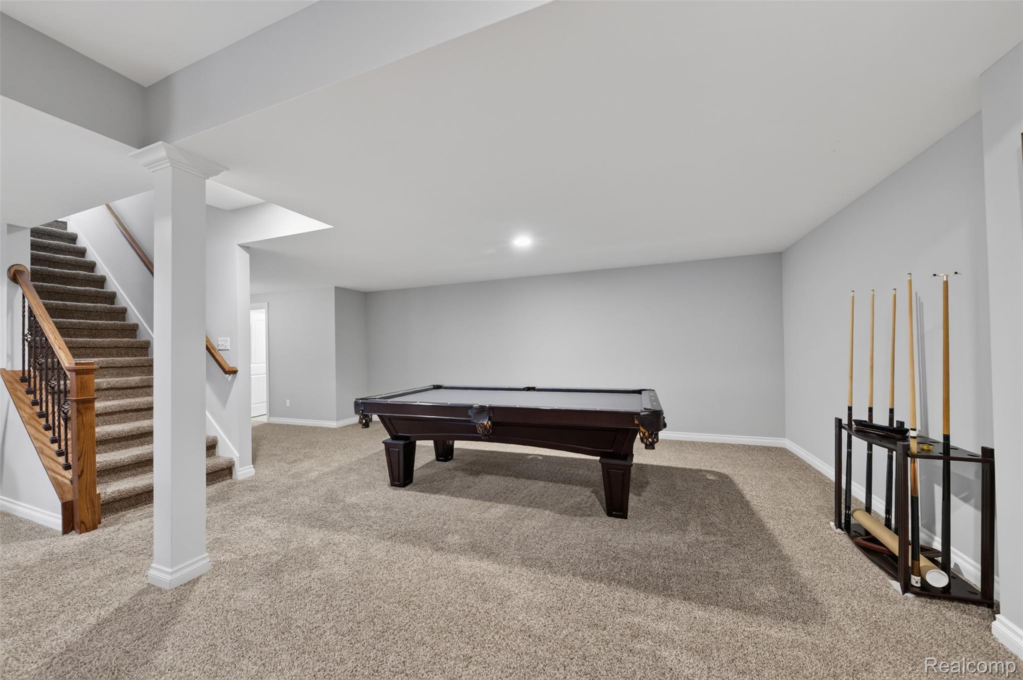 2531 Walnut View Drive Howell, MI 48855 - Photo 25 of 34 Spacious lower-level area with neutral carpeting and light gray walls