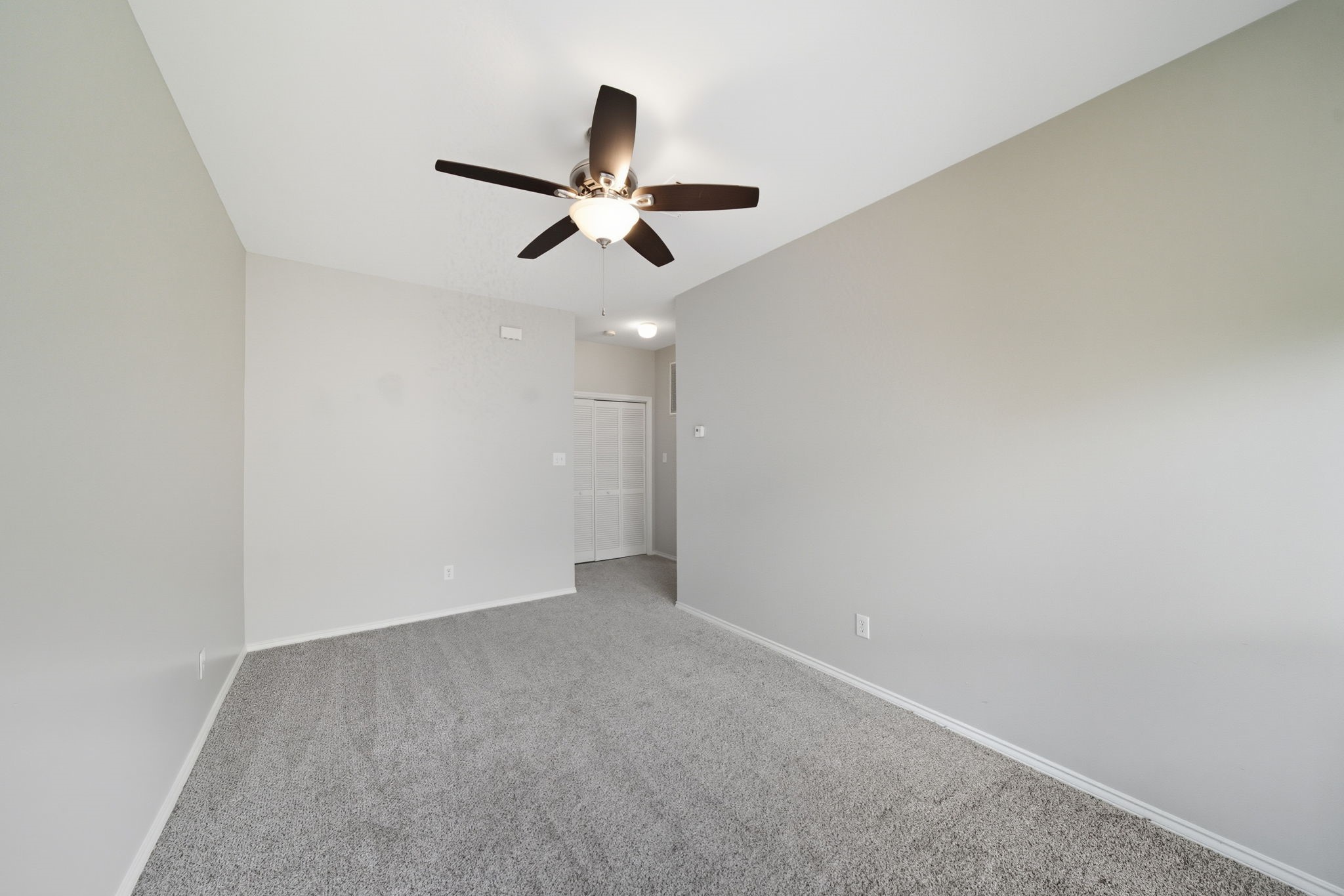 1507 Sutton Street Houston, TX 77006 - Photo 11 of 22 a view of a big room with a ceiling fan