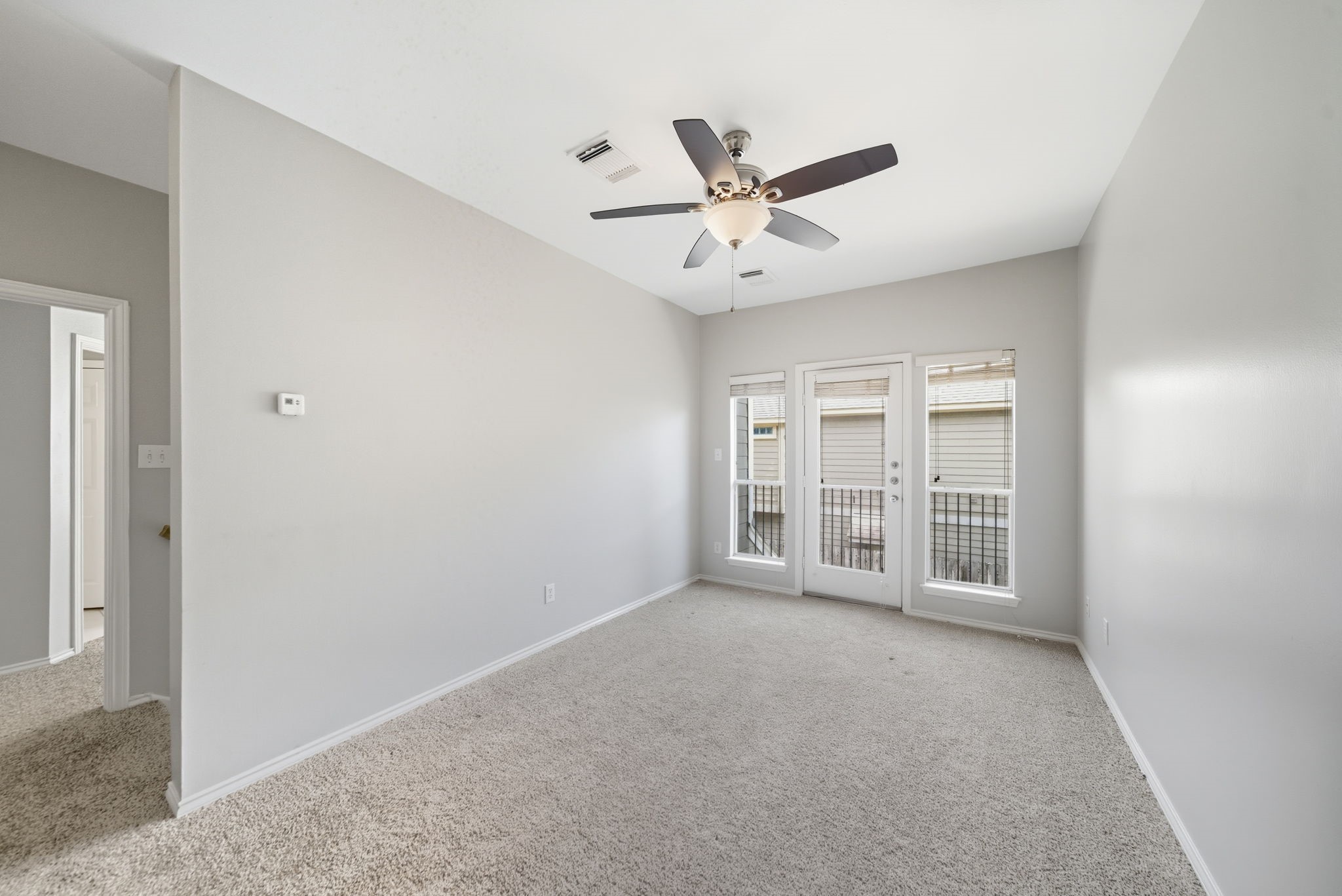 1507 Sutton Street Houston, TX 77006 - Photo 10 of 22 a view of an empty room with a window
