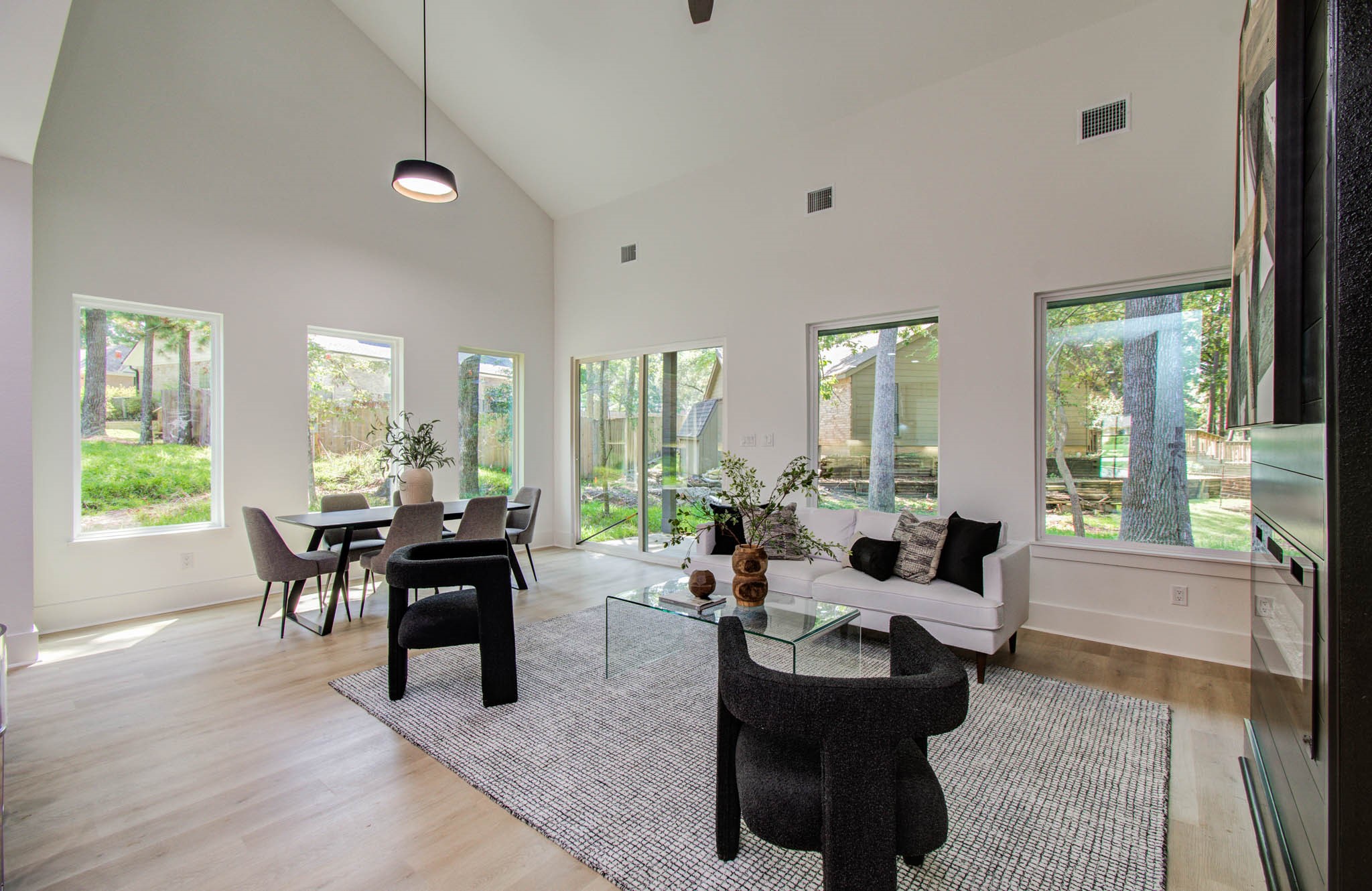 1802 Rollingwood Drive Huntsville, TX 77340 - Photo 14 of 38 a living room with furniture and large windows