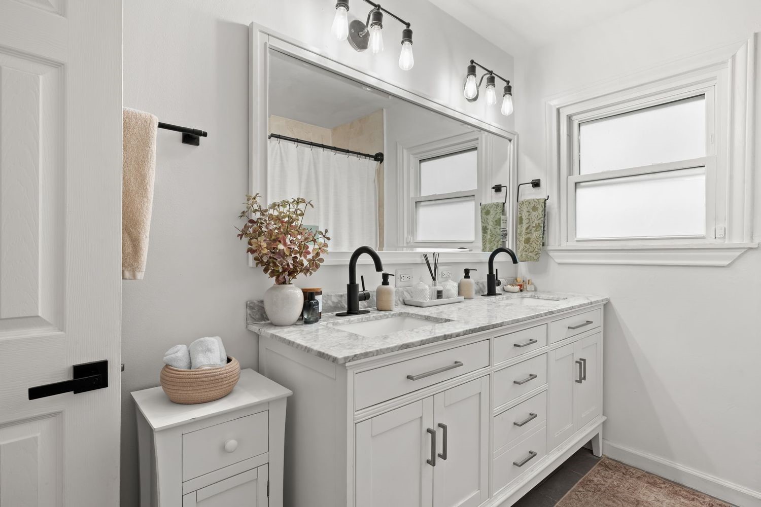 1516 Lawrence Street Houston, TX 77008 - Photo 16 of 32 a bathroom with a granite countertop sink mirror and vanity