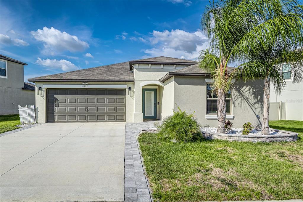 8812 Parsons Hill Boulevard Wesley Chapel, FL 33545 - Photo 1 of 1 a front view of a house with a yard