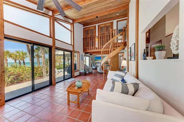 a kitchen with stainless steel appliances a refrigerator and a stove top oven