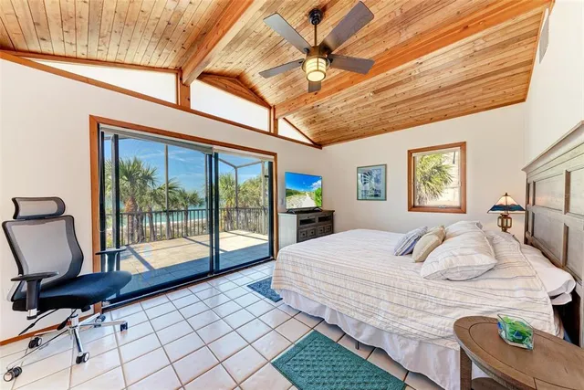 a view of swimming pool with seating space