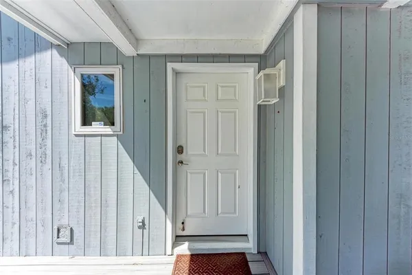 a kitchen with stainless steel appliances granite countertop a refrigerator a stove top oven a sink dishwasher and wooden cabinets