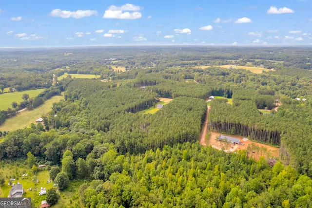 a view of a lake with a yard