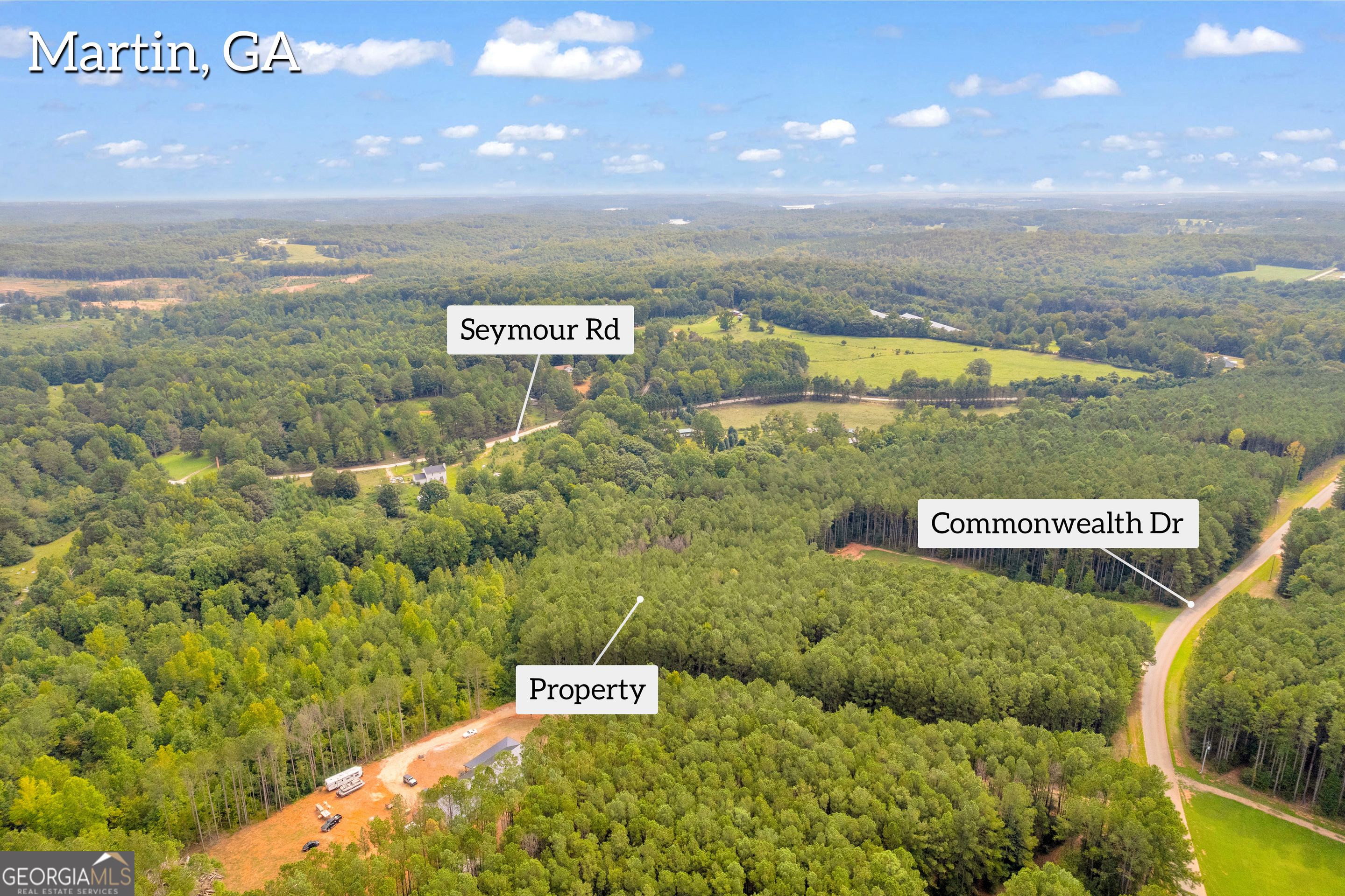 0 Moonlight Drive Toccoa, GA 30577 - Photo 20 of 23 a view of a swimming pool with an outdoor space and seating area