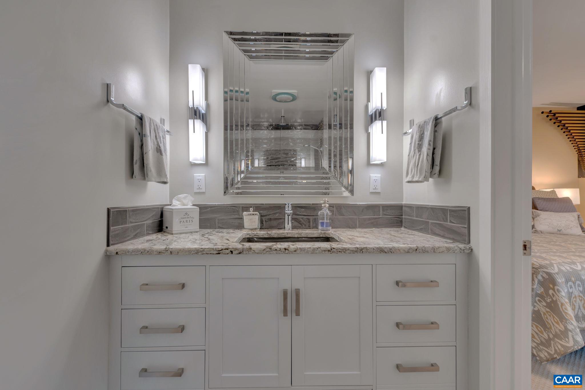 17 Bonita Road Palmyra, VA 22963 - Photo 27 of 74 a bathroom with a granite countertop sink a mirror and shower
