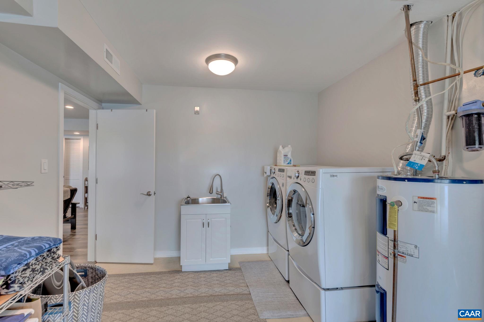 17 Bonita Road Palmyra, VA 22963 - Photo 67 of 74 a utility room with multiple dryer and washer