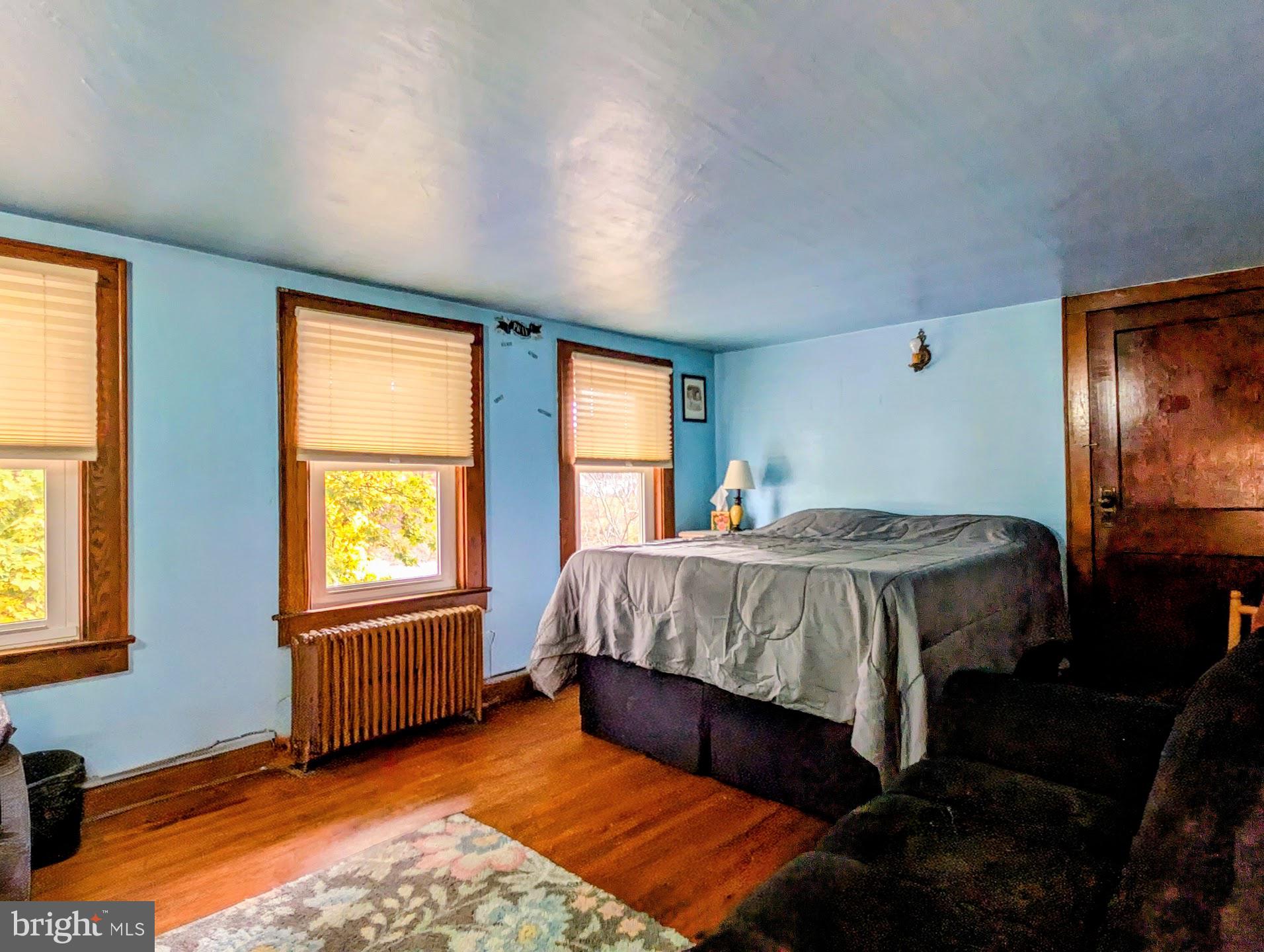 83 State Street Everett, PA 15537 - Photo 23 of 39 a bedroom with a bed and a window
