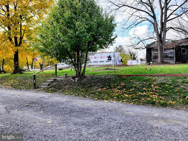 a front view of a house with a porch