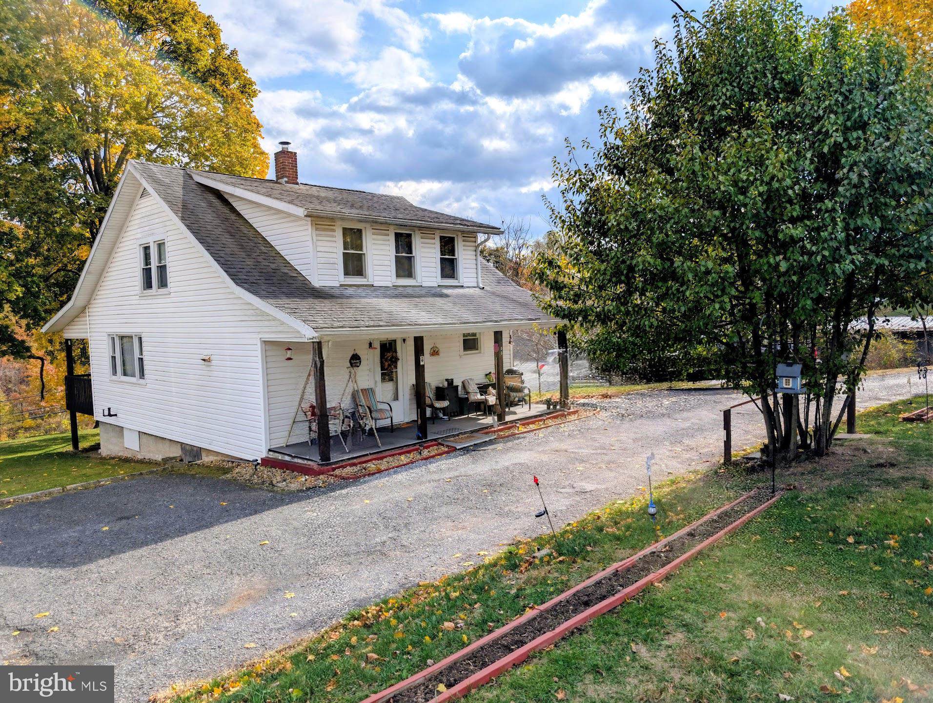 83 State Street Everett, PA 15537 - Photo 5 of 39 a view of house with yard