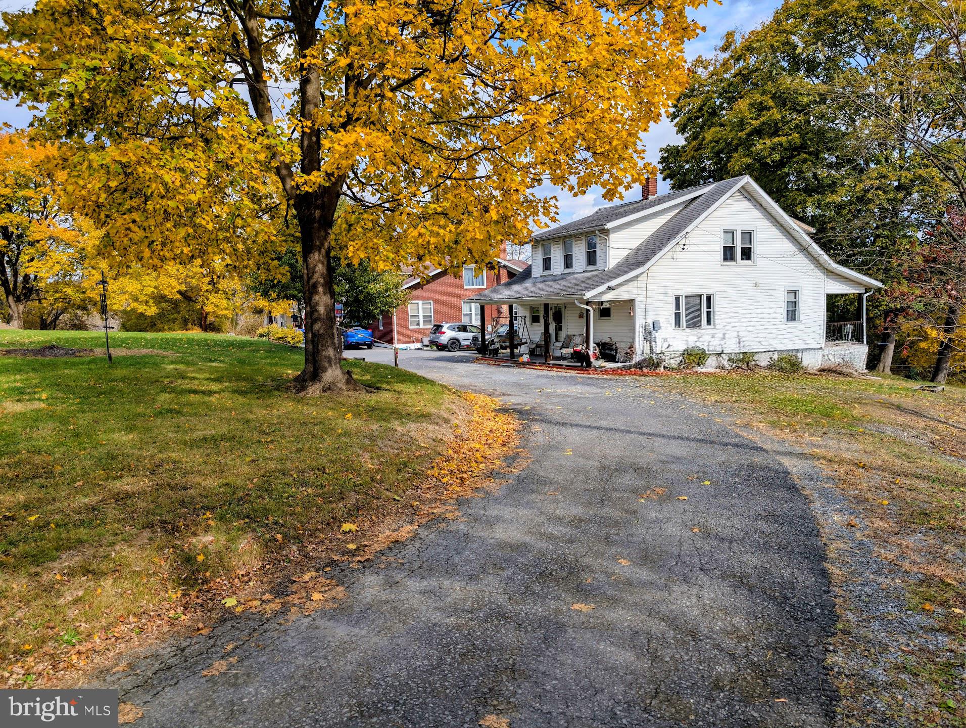 83 State Street Everett, PA 15537 - Photo 7 of 39 a view of a house with a yard
