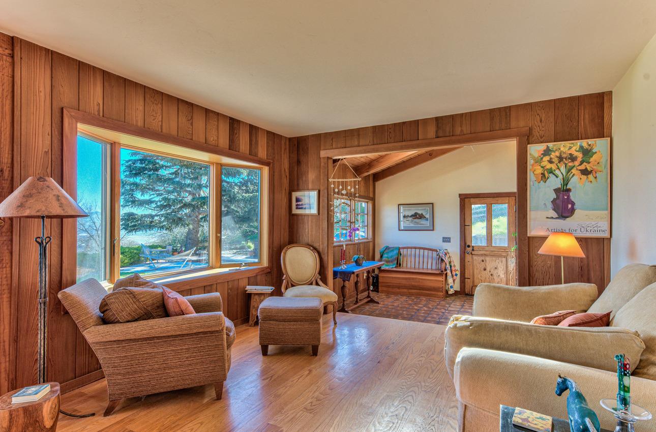 1352 C River Road Salinas, CA 93908 - Photo 12 of 35 a living room with furniture and a large window