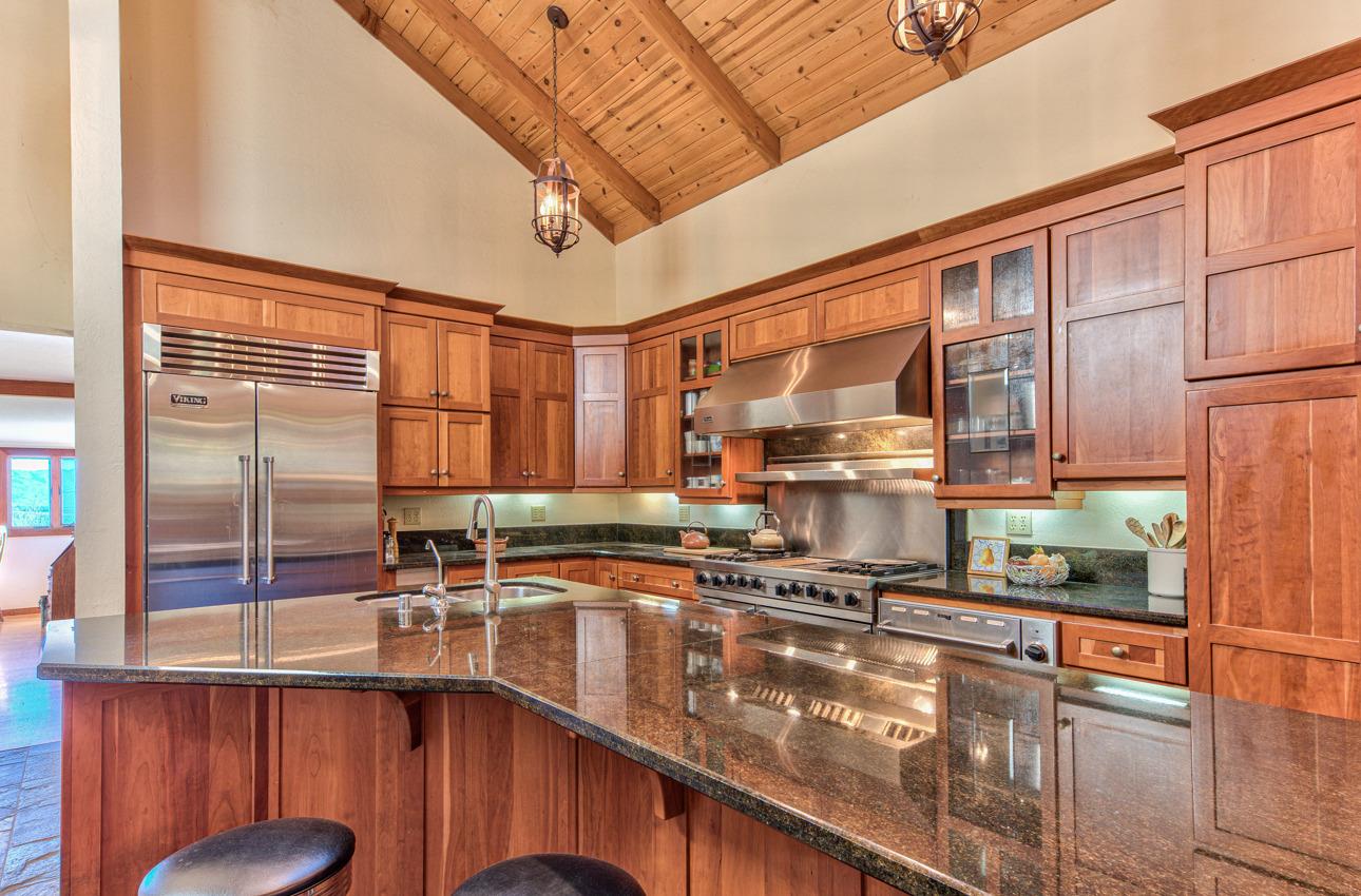 1352 C River Road Salinas, CA 93908 - Photo 18 of 35 a kitchen with stainless steel appliances granite countertop a sink a stove and a refrigerator