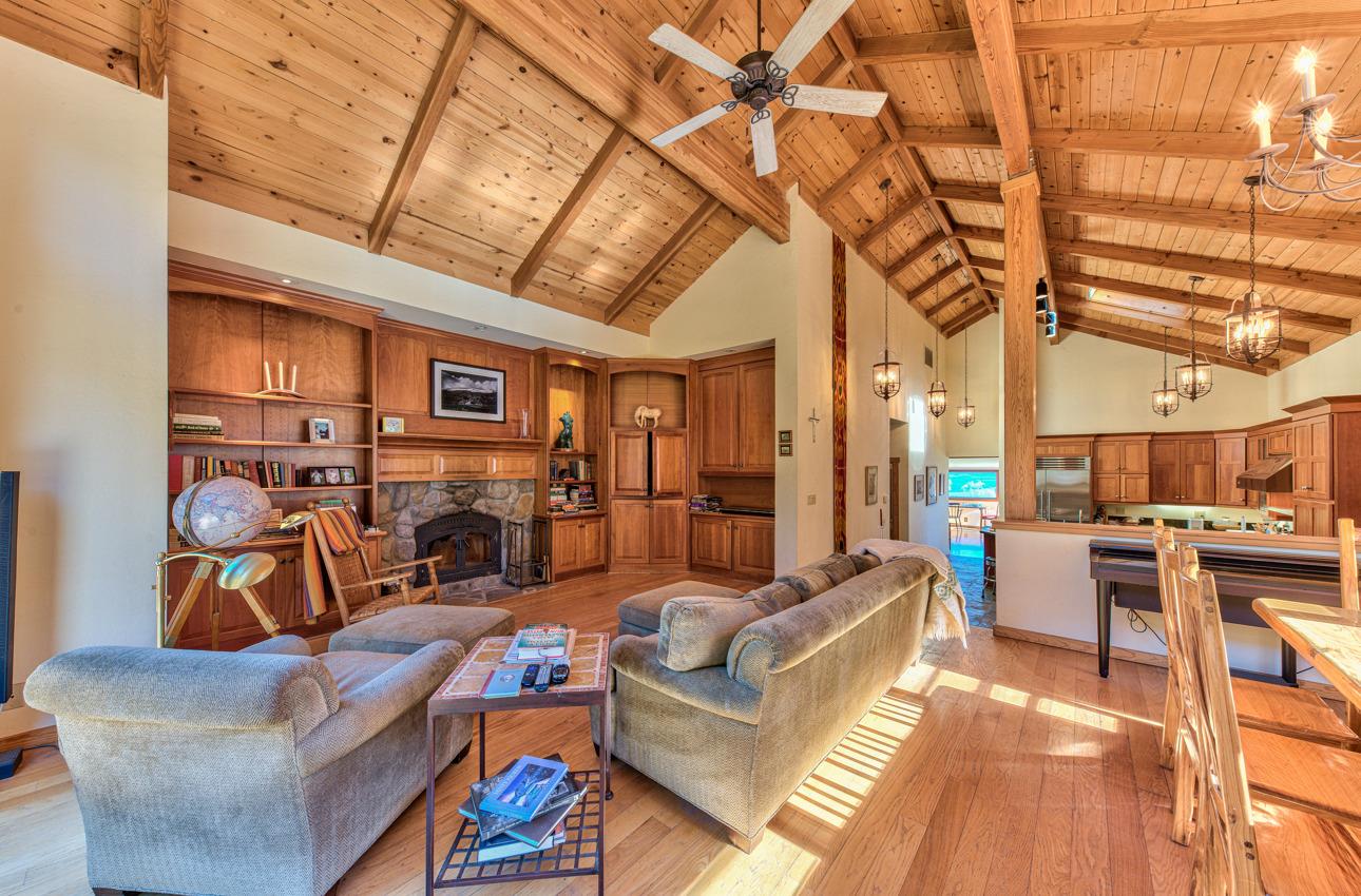 1352 C River Road Salinas, CA 93908 - Photo 22 of 35 a living room with furniture and a chandelier