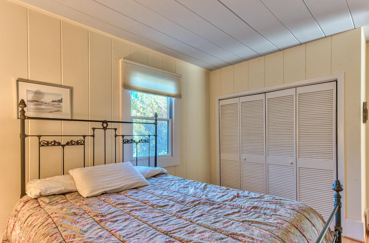 1352 C River Road Salinas, CA 93908 - Photo 27 of 35 a bedroom with a bed and a window