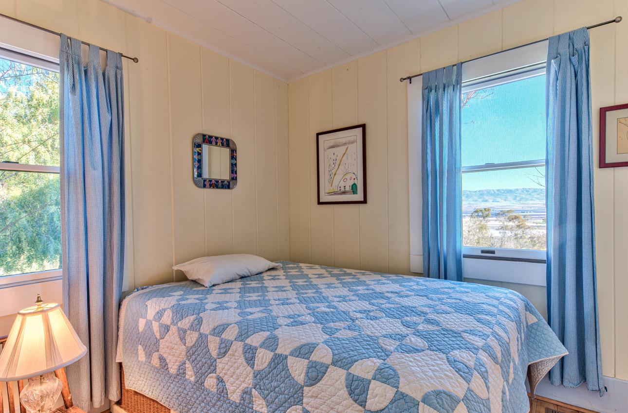 1352 C River Road Salinas, CA 93908 - Photo 28 of 35 a bedroom with a bed and a window