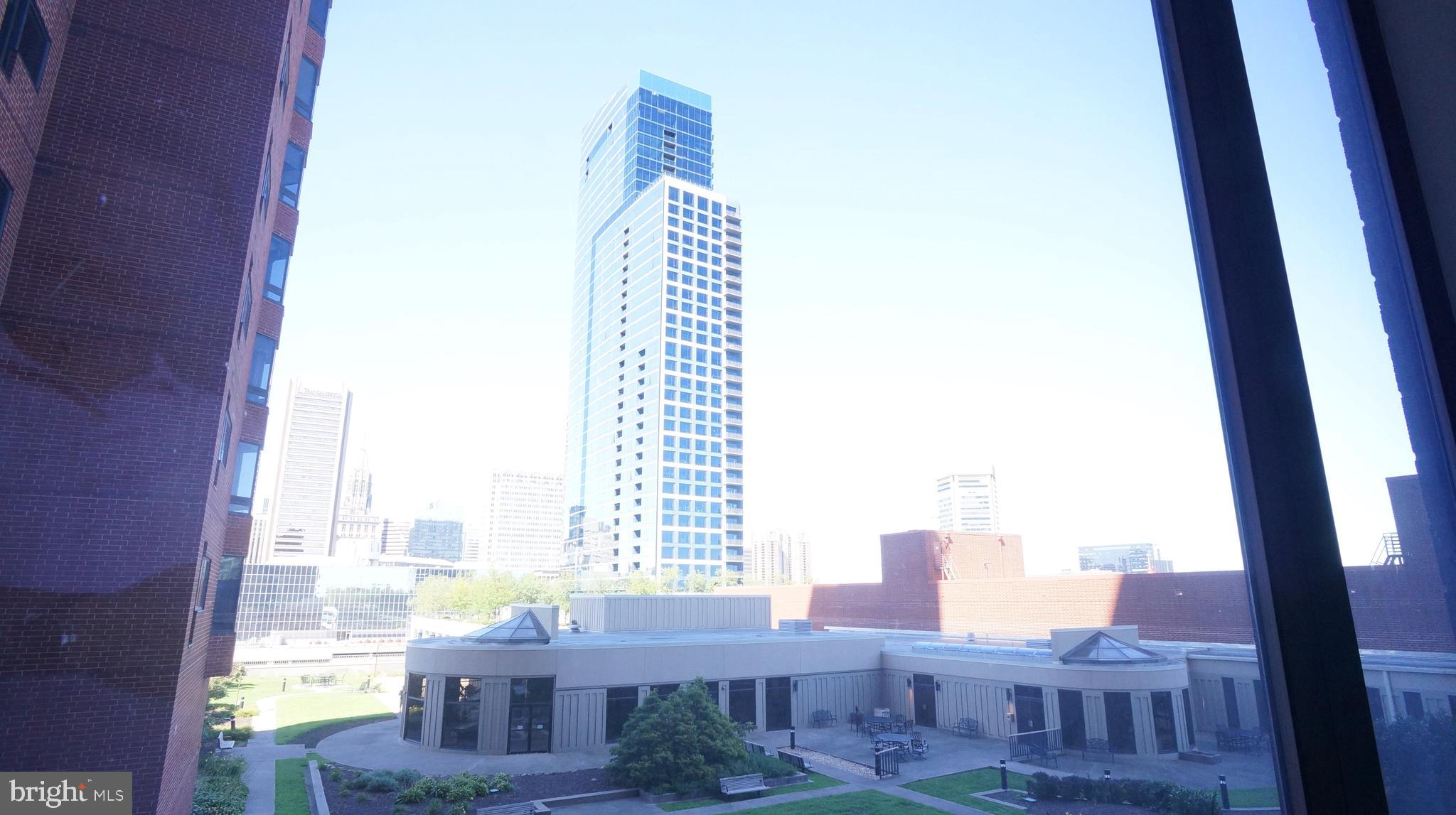 10 East Lee Street, Unit 705 Baltimore, MD 21202 - Photo 14 of 48 a view of city with balcony