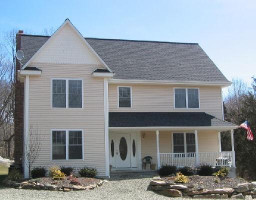 30 Nicholdale Road Shelton, CT 06484 - Photo 1 of 1 a front view of a house with garden