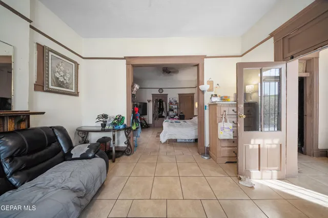 a kitchen with a stove a sink and a refrigerator