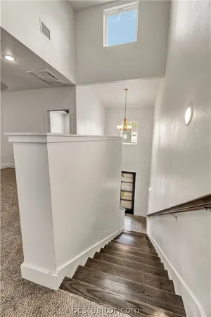 a view of a livingroom with wooden floor