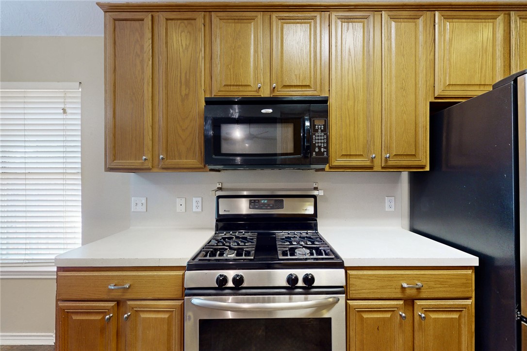 2817 Brandywine Circle Bryan, TX 77807 - Photo 12 of 28 a stove top oven sitting inside of a kitchen