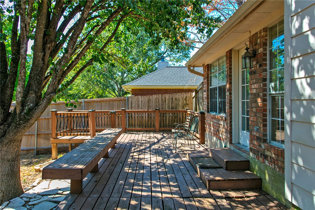 2817 Brandywine Circle Bryan, TX 77807 - Photo 25 of 28 a view of a roof deck with wooden floor and fence