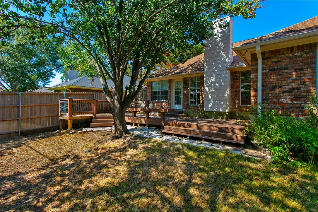 2817 Brandywine Circle Bryan, TX 77807 - Photo 26 of 28 a view of a house with backyard and sitting area