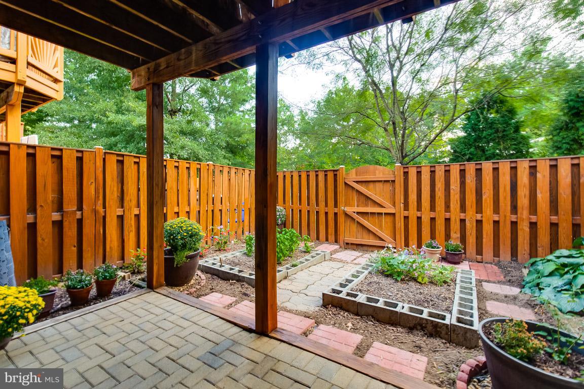 14817 Edman Road Centreville, VA 20121 - Photo 27 of 30 Beautiful rear patio w/ vegetable and flower beds