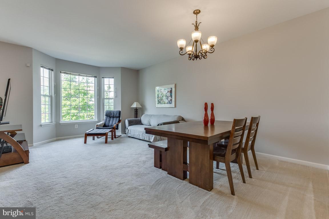 14817 Edman Road Centreville, VA 20121 - Photo 4 of 30 Spacious living room/dining area. Versatile space
