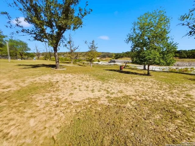 a view of a pool with an ocean view