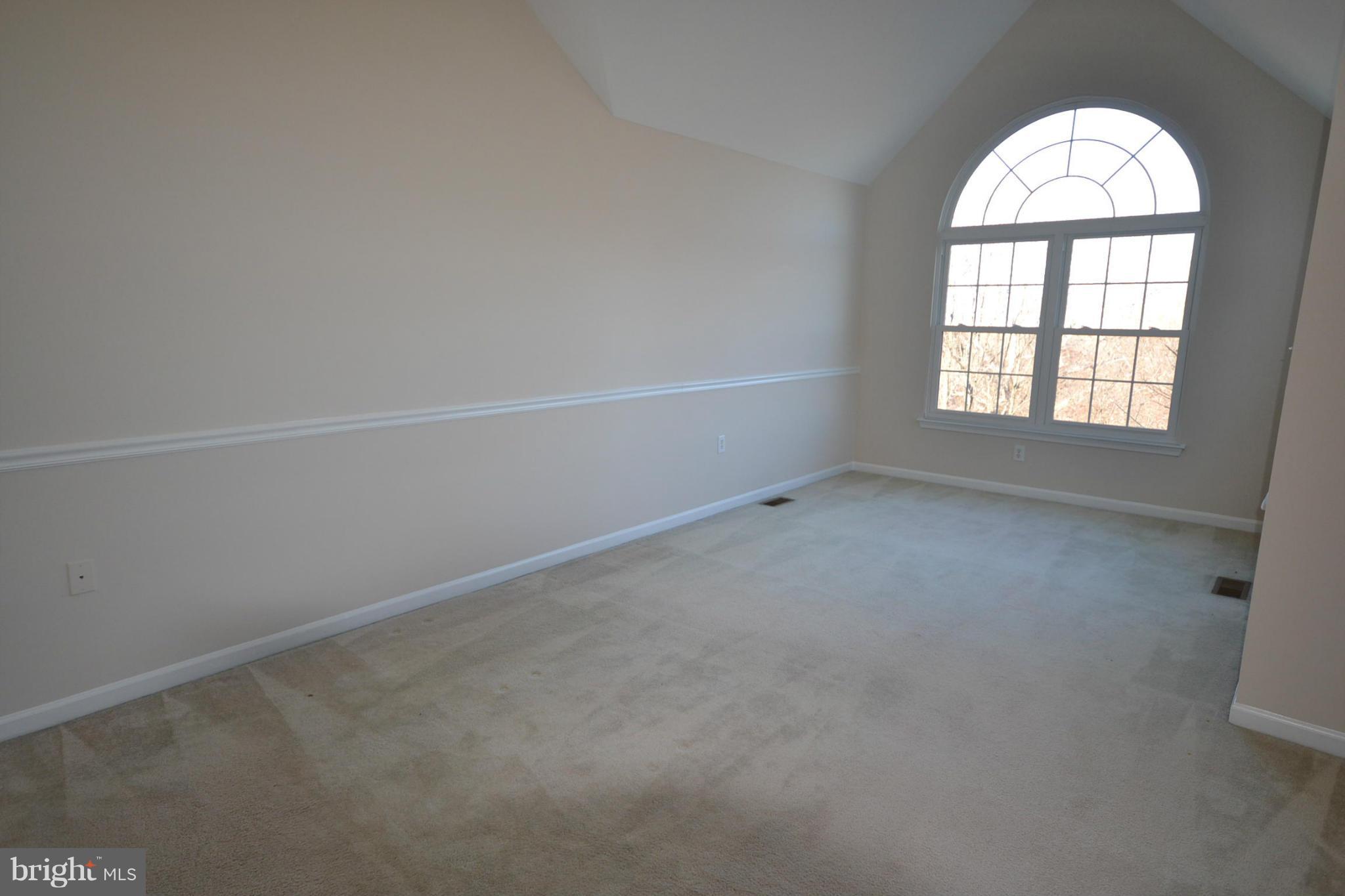 2629 Caulfield Court Frederick, MD 21701 - Photo 8 of 17 an empty room with windows