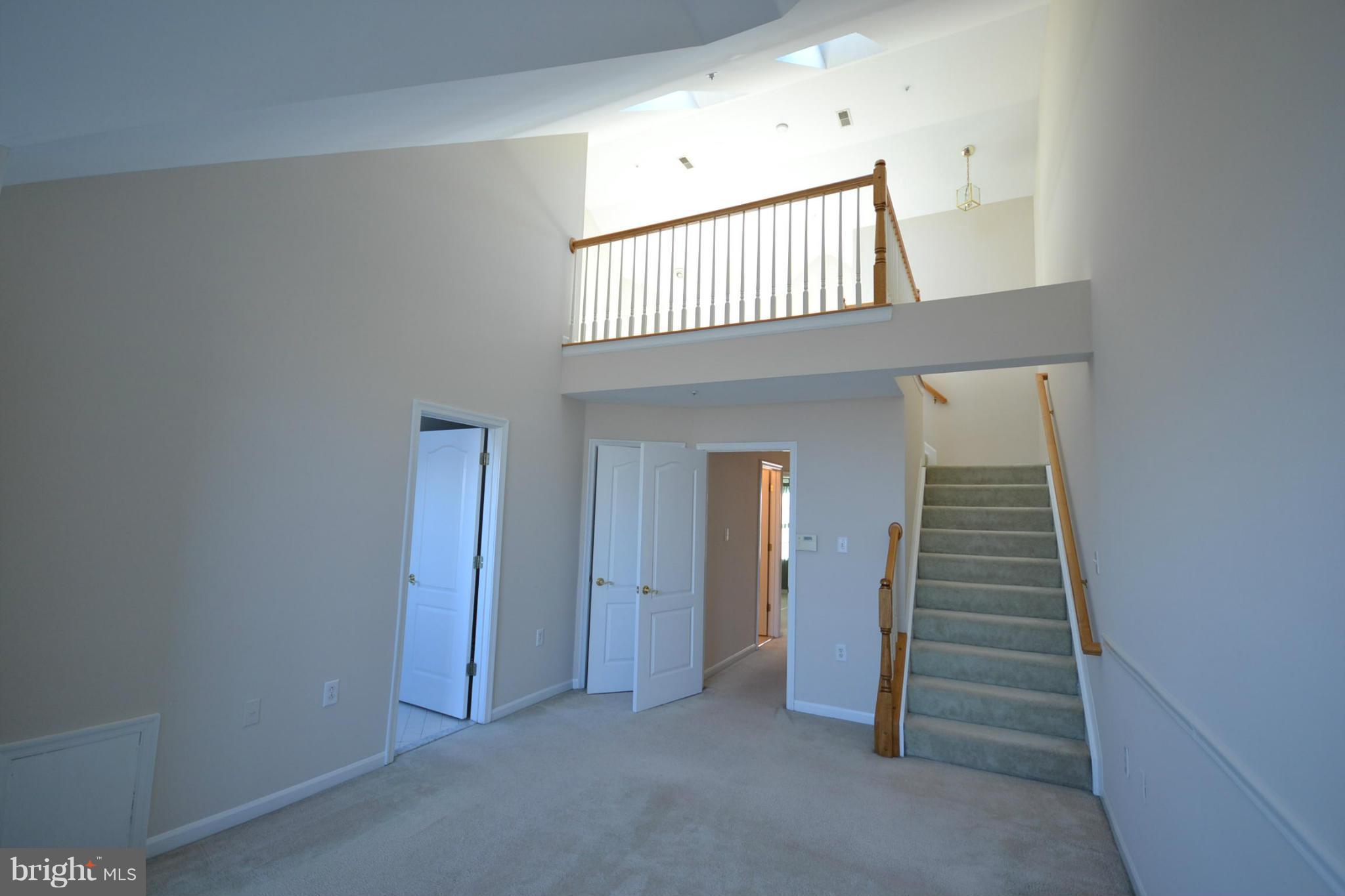 2629 Caulfield Court Frederick, MD 21701 - Photo 9 of 17 an entryway in a hall with a window