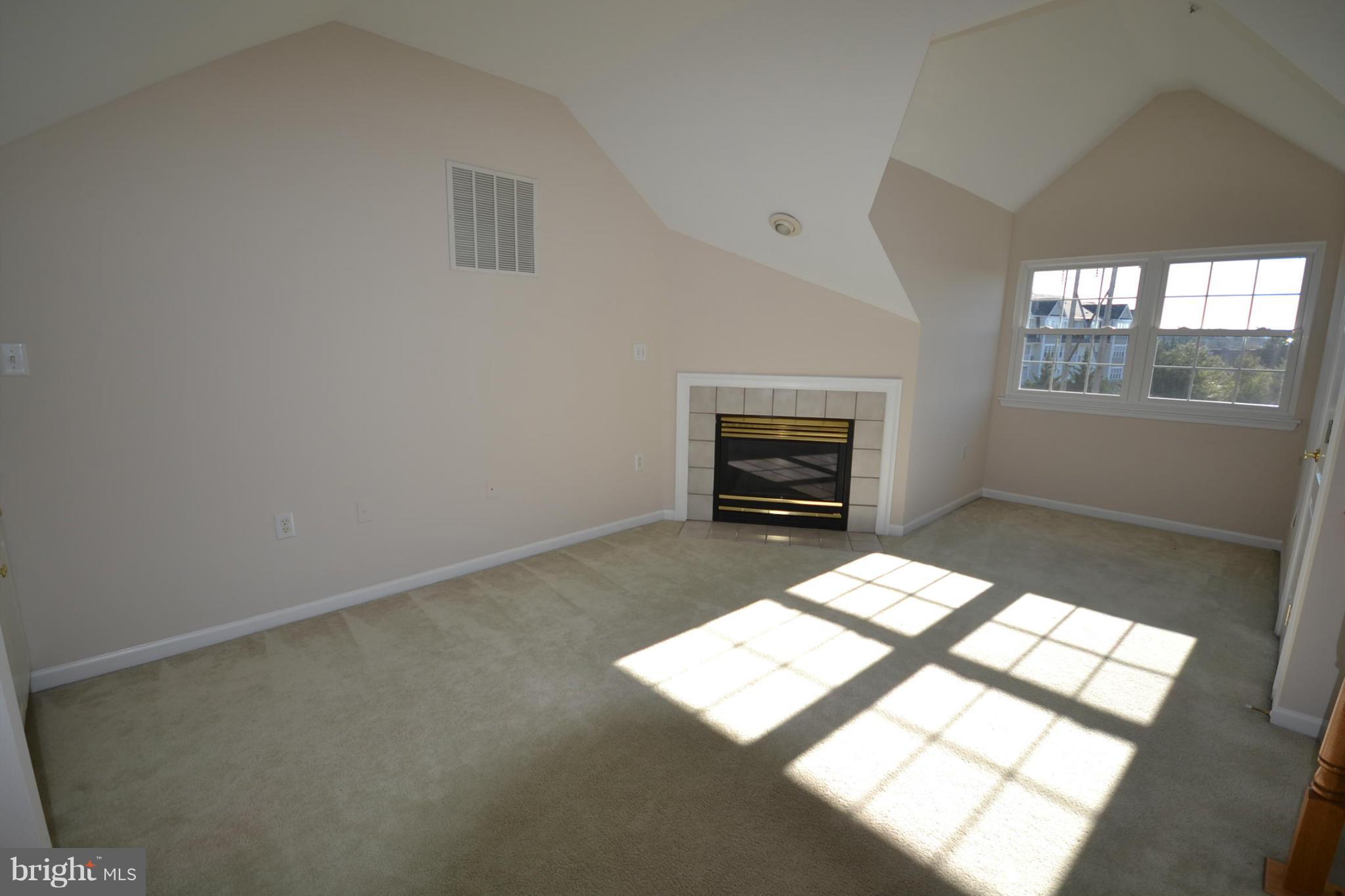 2629 Caulfield Court Frederick, MD 21701 - Photo 10 of 17 wooden floor in an empty room with a window