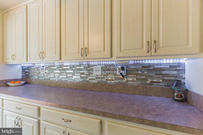 3450 Allday Road Huntingtown, MD 20639 - Photo 11 of 23 a kitchen with a sink and cabinets