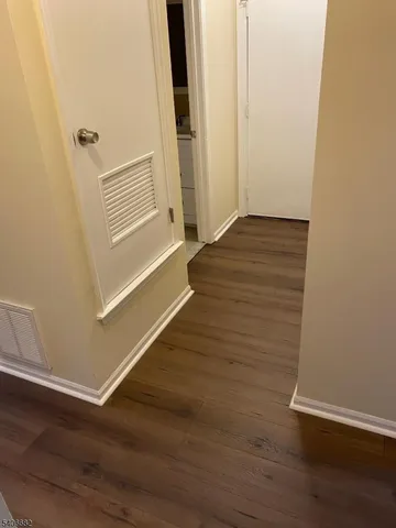 a stove top oven sitting inside of a kitchen