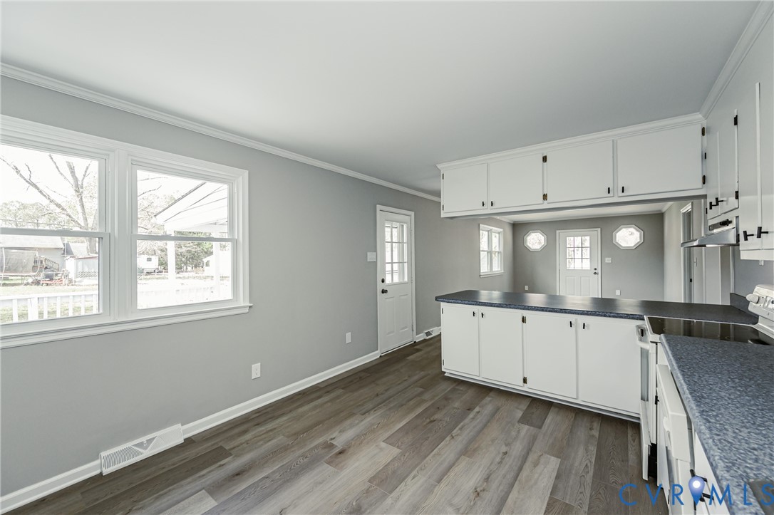 15412 Exter Mill Road Chesterfield, VA 23838 - Photo 29 of 66 Kitchen featuring white electric range oven, dark