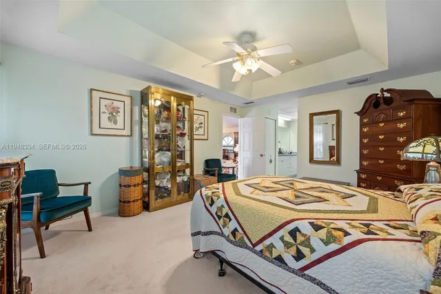 a spacious bathroom with a sink a mirror and a bathtub
