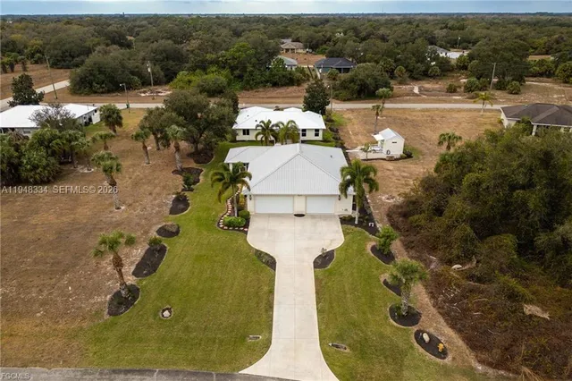 an aerial view of a house with a garden