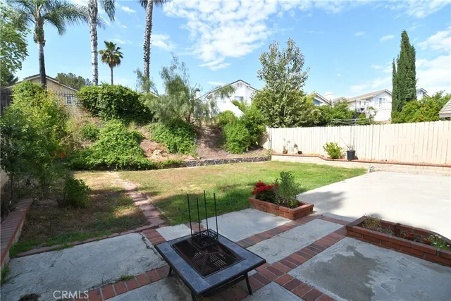 a view of a garden with a bench