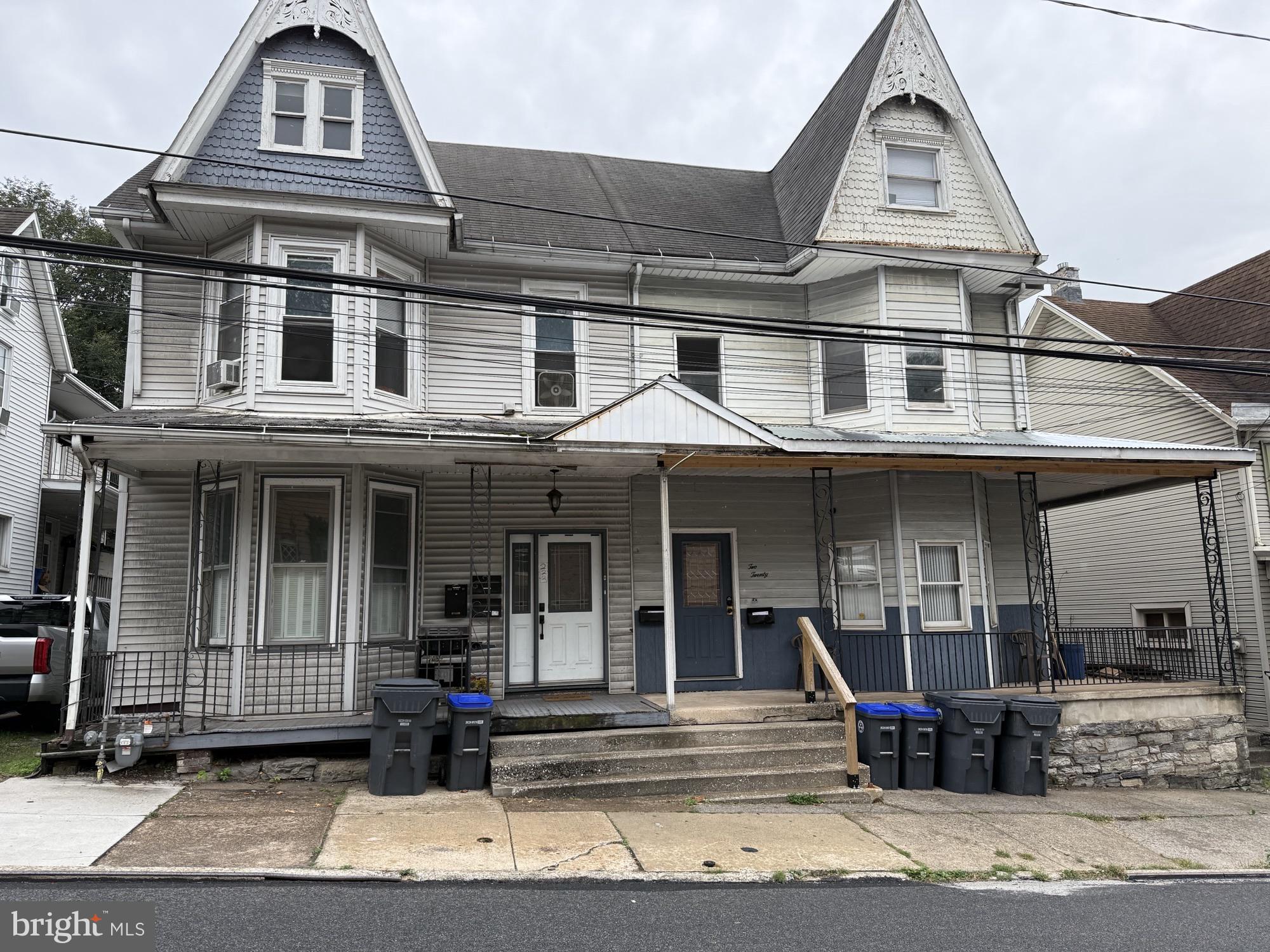 222 Pine Street Steelton, PA 17113 - Photo 1 of 14 a view of a white house with large windows