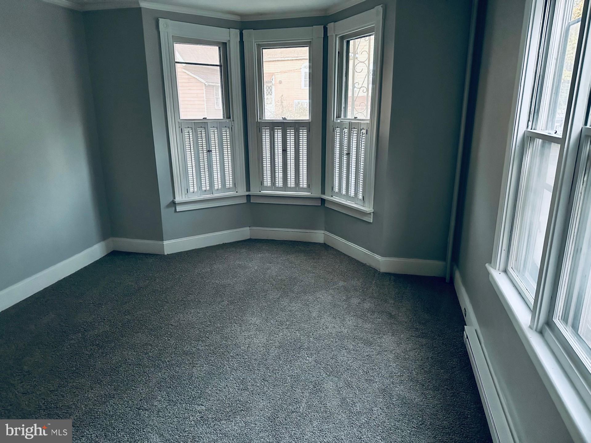 222 Pine Street Steelton, PA 17113 - Photo 8 of 14 an empty room with windows