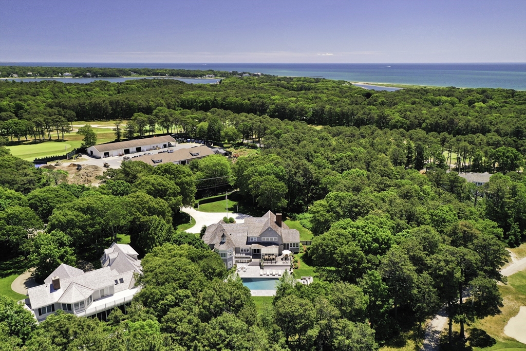 207 Pineleigh Path Barnstable, MA 02655 - Photo 2 of 42 an aerial view of a house with a garden