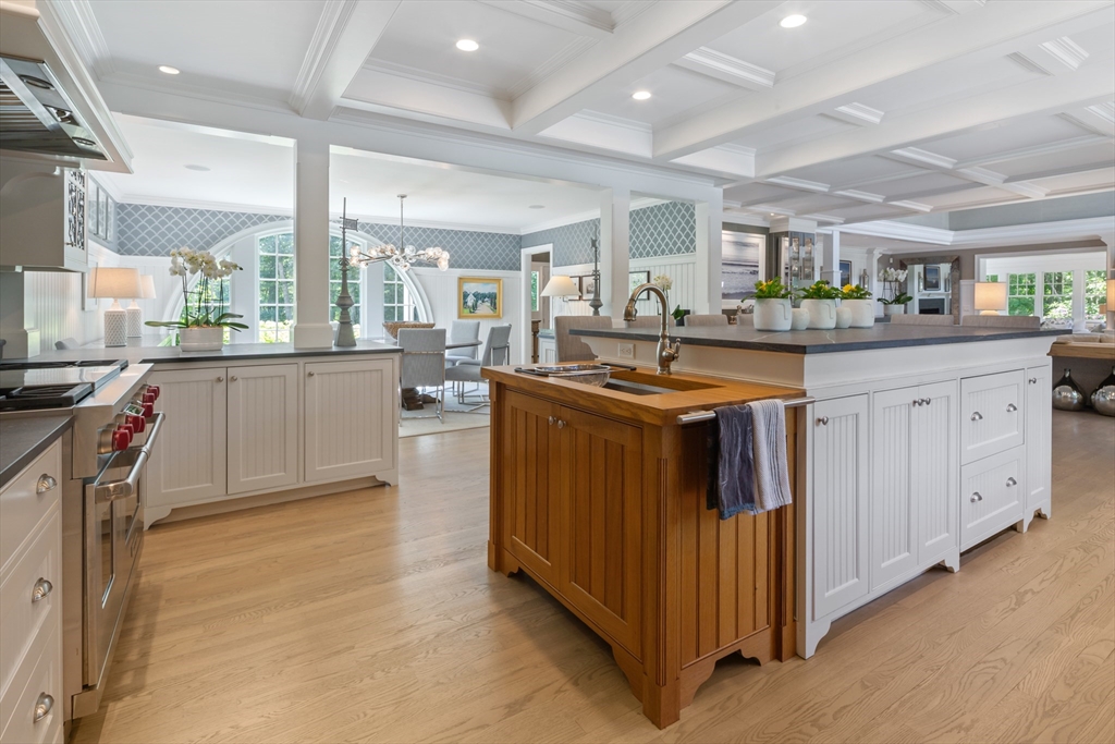 207 Pineleigh Path Barnstable, MA 02655 - Photo 23 of 42 a kitchen with stainless steel appliances granite countertop a stove and a sink