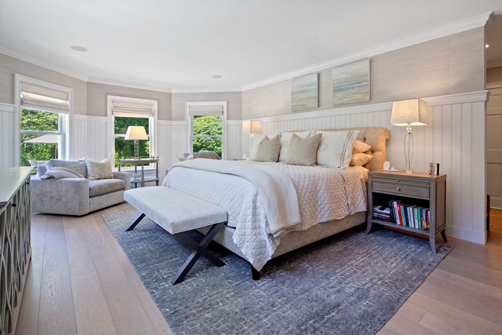 207 Pineleigh Path Barnstable, MA 02655 - Photo 30 of 42 a bedroom with a bed a couch and a dresser next to a window