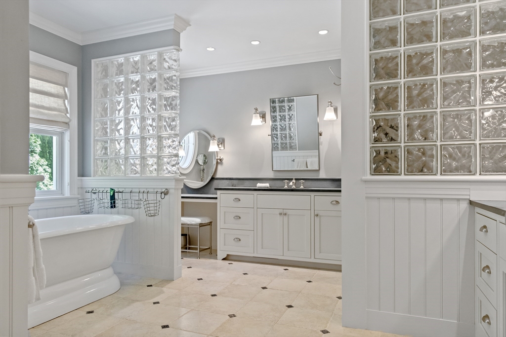 207 Pineleigh Path Barnstable, MA 02655 - Photo 31 of 42 a bathroom with a sink a vanity and a mirror